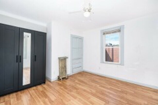 Building Photo - Renovated 4BR with In-Unit Laundry Near Moody Street
