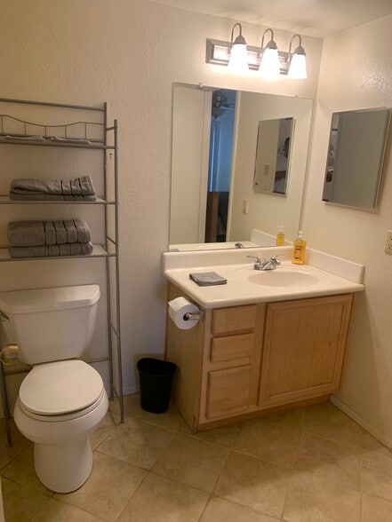 Furnished, ground floor, 2-bedroom condo with assigned covered parking.Pool,Spa,Tennis, Gym. - 5757 W Eugie Ave