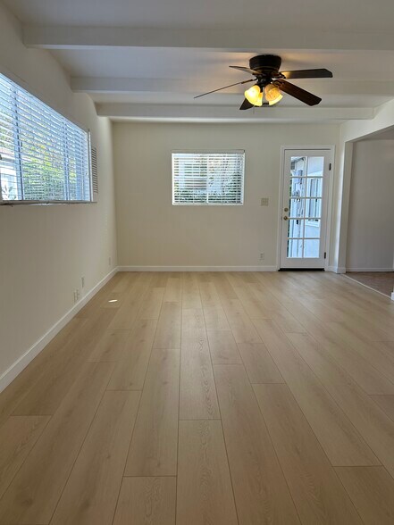 Family room with door to driveway - 10760 Russett Ave