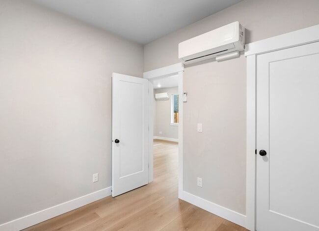 Building Photo - Brand-New Detached 2 Bedroom Home with Private Fenced Yard and Designer Finishes