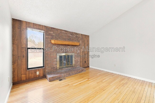 Building Photo - 8917 E Chenango Ave