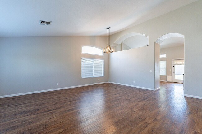 Building Photo - Charming 4-Bedroom Home with Luxurious Poo...