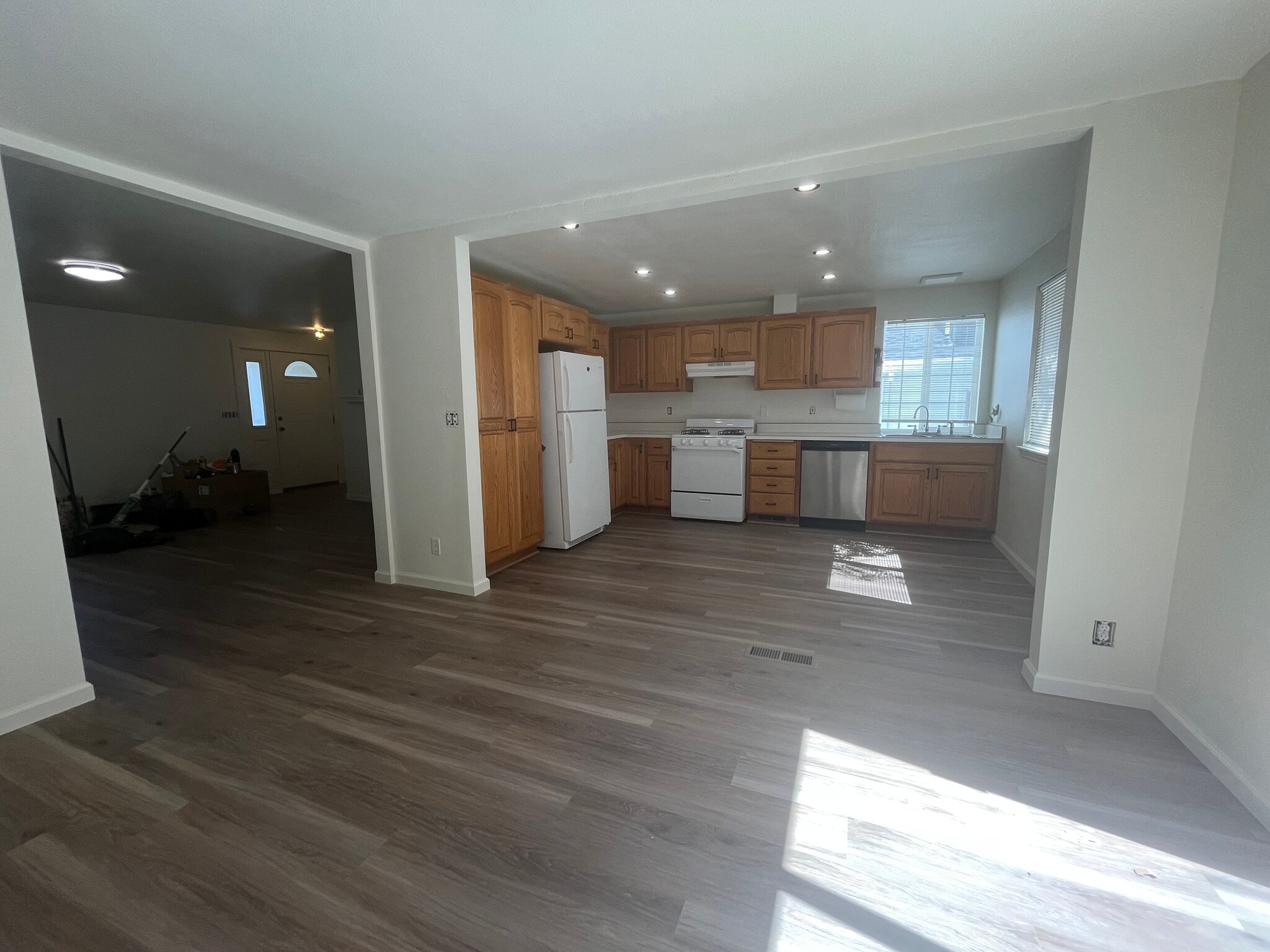 View of kitchen from dining room. - 2143 SE Douglas Ave