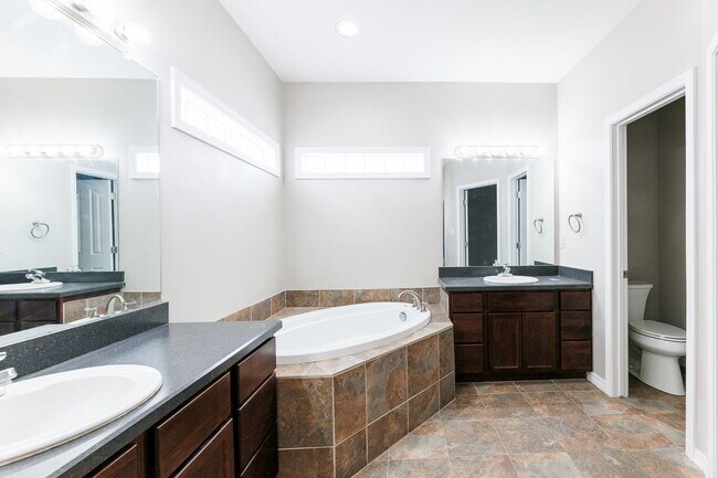 Building Photo - Spacious 3-Bedroom in Gated Community