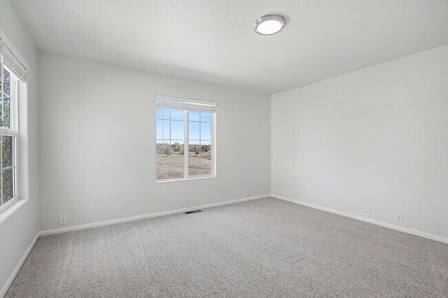 Building Photo - Beautifully Updated 3-Bedroom End-Unit Townhome Facing Open Space with Attached 2-Car Garage in G...