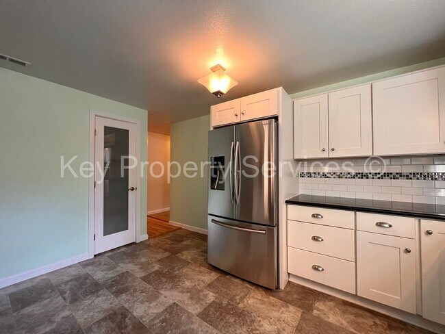Building Photo - Orchards Ranch with Large Fenced Yard - Re...
