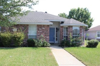 Building Photo - 7214 Maplewood Dr