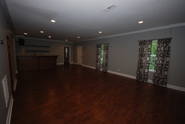 Building Photo - Oversized Executive Style Home with Finish...