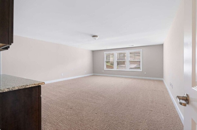 Building Photo - Luxurious 4-Bedroom Retreat with Third Floor Bonus Room & Fenced-in Backyard