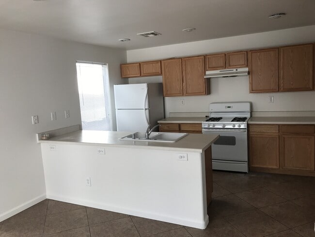 Building Photo - 3 bedroom home with granite tops and tile floors $1500.00/month