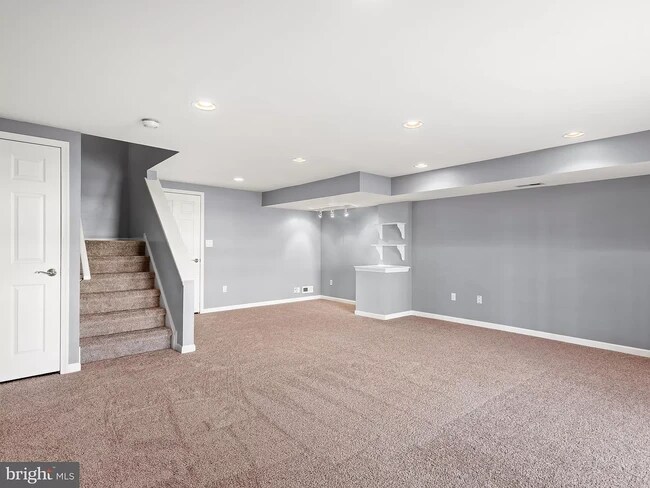 Downstairs you'll find a very large finished basement ready for you! - 232 Carlyn Ct