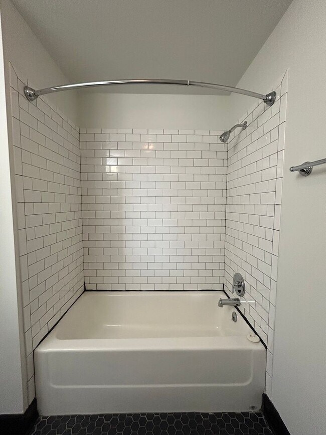 Building Photo - Sleek Downtown Living with a Modern Edge