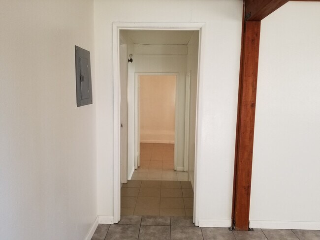 Building Photo - Triplex Unit Coming Soon