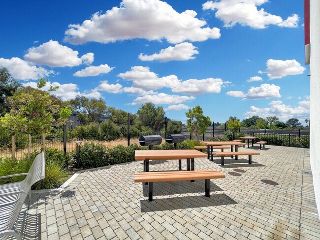 Building Photo - Modern 2BD Fremont Condo – EV Charger, Bal...