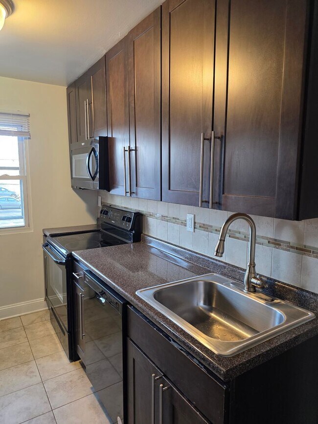 Building Photo - Village Arms Apartments