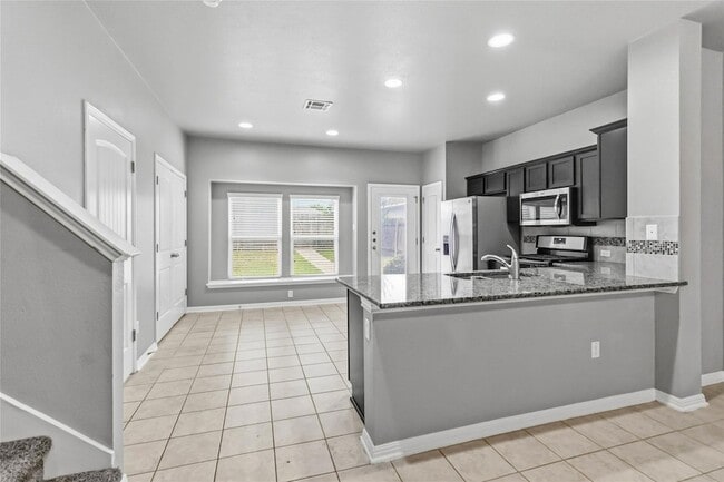 Building Photo - 718 Stampede Rd
