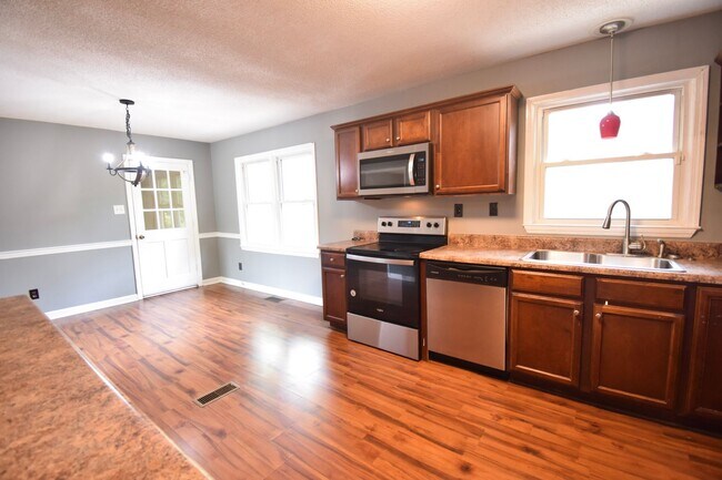 Building Photo - COMING SOON-4 Bedroom, 2.5 Bathroom Home- Pets Allowed