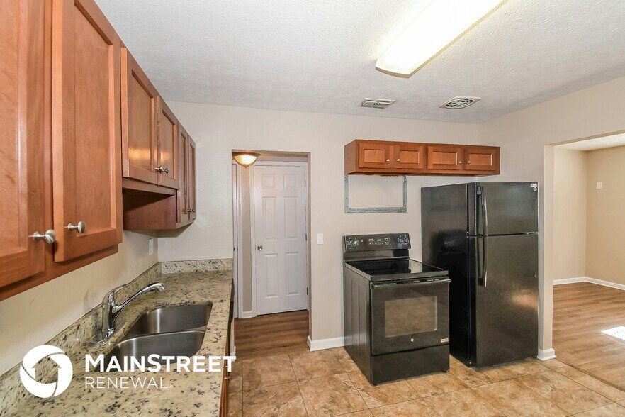 Building Photo - 7147 Eudine Dr N