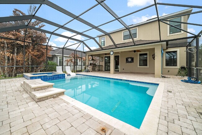 Building Photo - 4BR, 2.5BA home with resort style outdoor living!