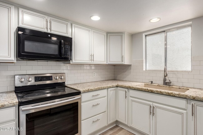 Building Photo - 7932 E Pecos Ln
