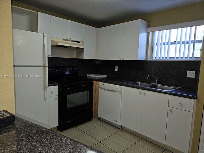 Building Photo - 4235 N University Dr