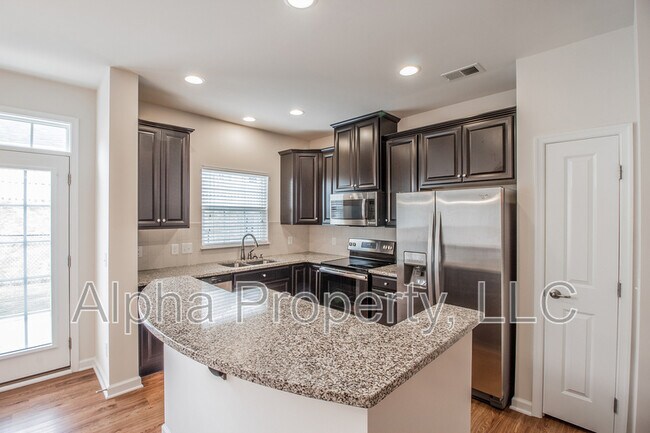 Building Photo - 305 Christiane Way