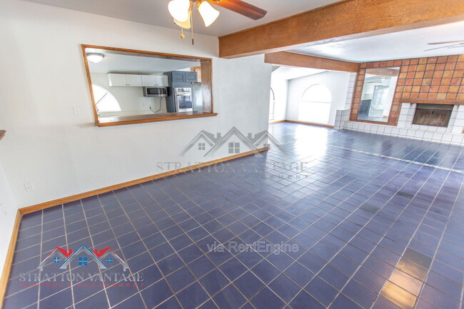 Building Photo - 8119 E Amelia Ave