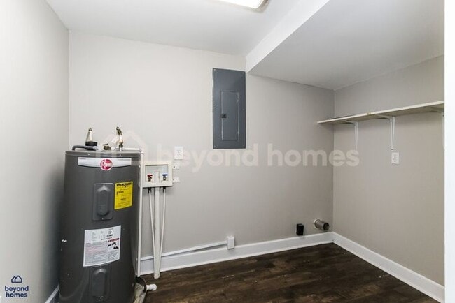 Building Photo - Updated Bungalow with Massive Deck and Fully Fenced Yard!