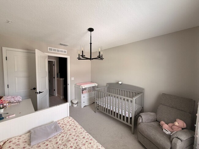 Building Photo - Elegant living in a vibrant, strategically located community—your perfect place to call home.