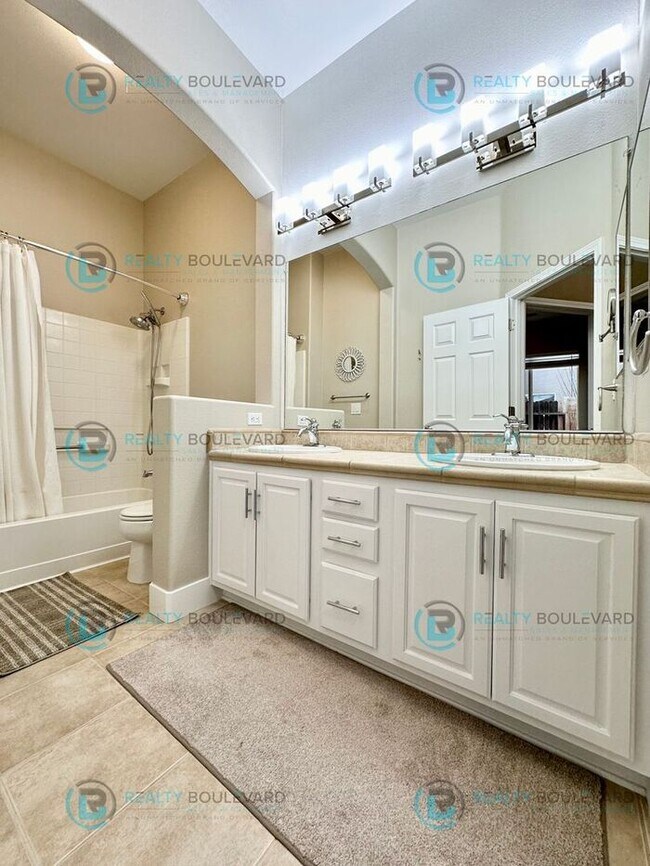 Building Photo - Open Kitchen, Expansive Living, and Covered Patio in Tranquil South Reno Near Trails, Parks & Sho...