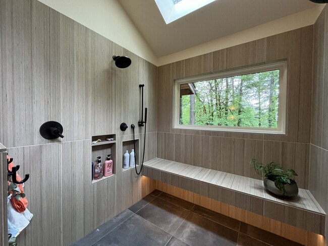 Building Photo - One-of-a-Kind Custom Home with Wall of Windows, Stone Fireplaces, Expansive Entertainment Space &...