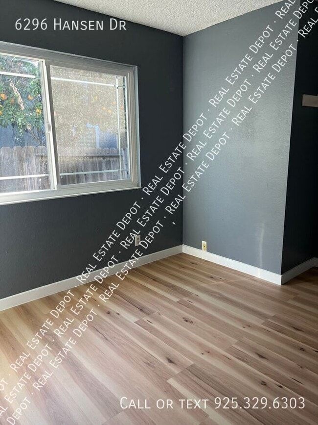 Building Photo - 6296 Hansen Dr