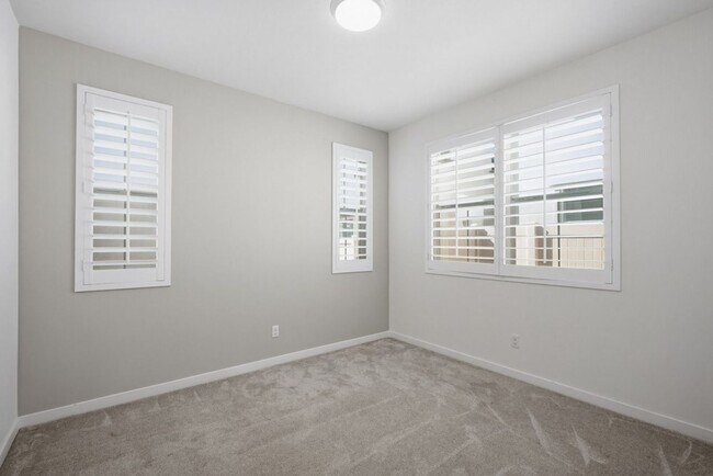 Building Photo - NEW LISTING 4 Bedroom, 3 Bathroom, 2 Garage Detached Condominium, with HVAC, Tankless Water Heate...