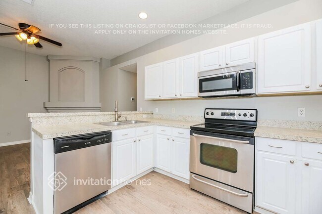 Building Photo - 4591 Misty Dawn Ct N