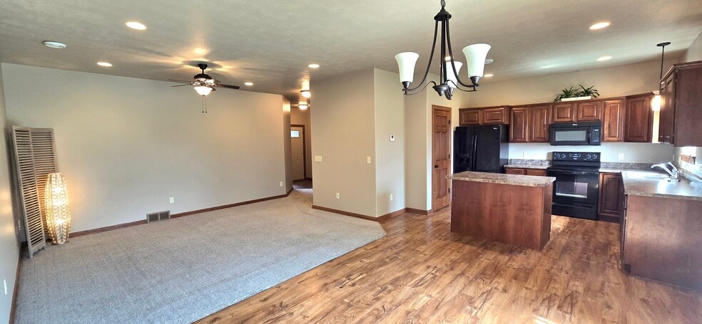 Living room- Kitchen View From Dining Area - 8413 W 53rd St