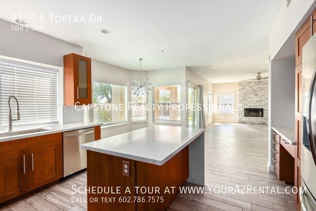 Building Photo - 9159 E Topeka Dr