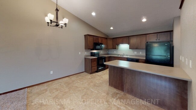 Building Photo - SPACIOUS AND AMENITY FILLED 3 BD, 2.5 BA T...