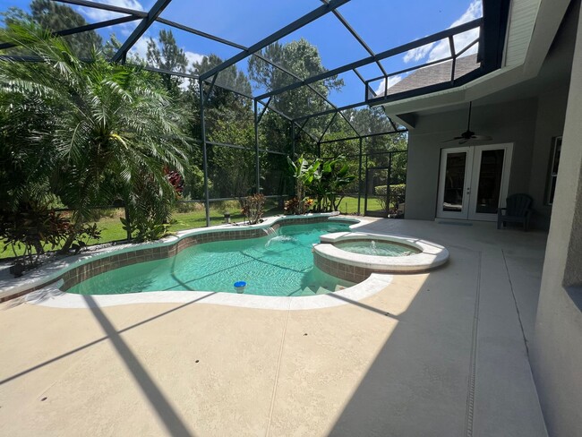 Building Photo - Beautiful 5 Bed 4 Bath Pool Home in the gu...