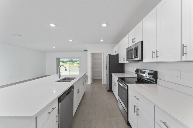 Building Photo - Almost New 4/3.5 Home with Waterview and 2...