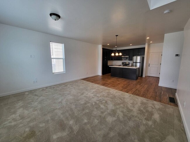 Building Photo - Pet Friendly Gorgeous Row End Townhome w 2 car attached garage!