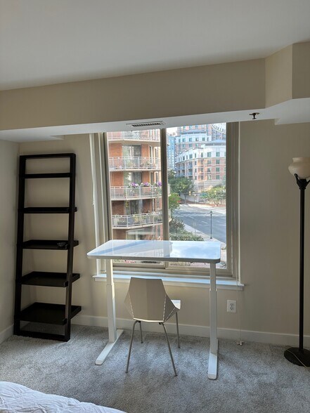 main bedroom (with electric standing desk) - 7500 Woodmont Ave