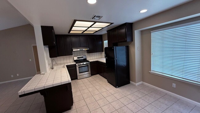 Building Photo - 5566 W Fir Ave