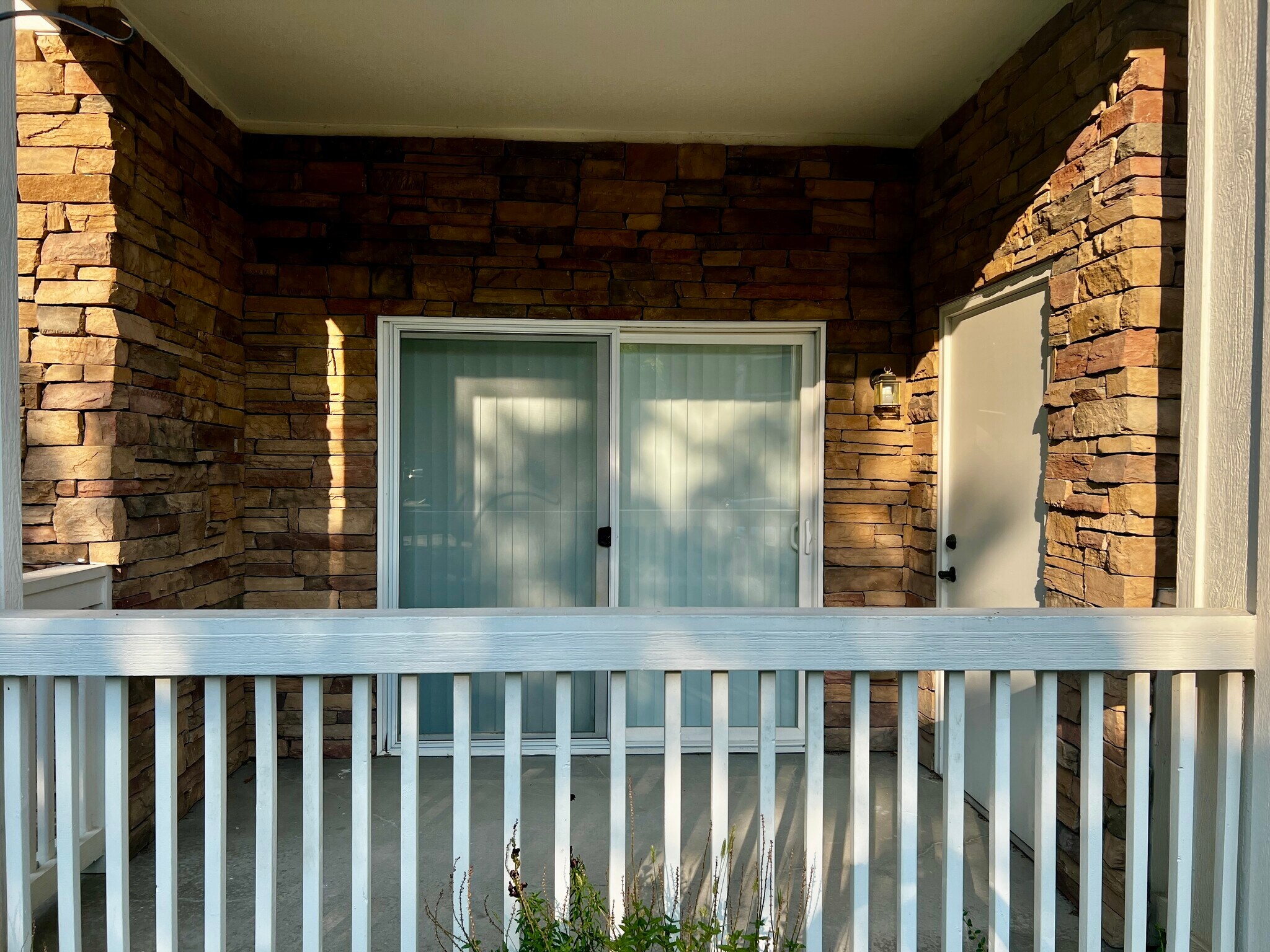 Private Patio with Pull-Down Shade & Storage - 8200 E 8th Ave