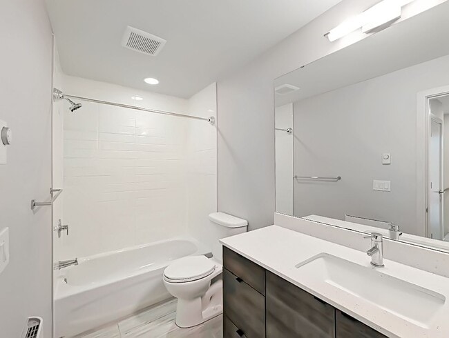 Building Photo - Stunning Two-Bedroom Townhome with Rooftop...