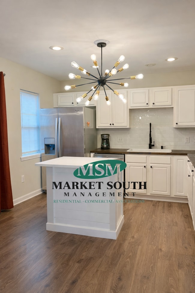 Building Photo - Townhome In Harmony Townes- Furnished or Unfurnished