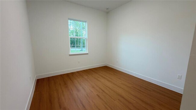 Building Photo - 7250 N Freeport Cir