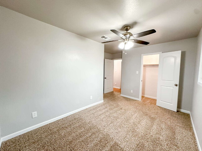 Building Photo - Spacious Living & Modern Upgrades