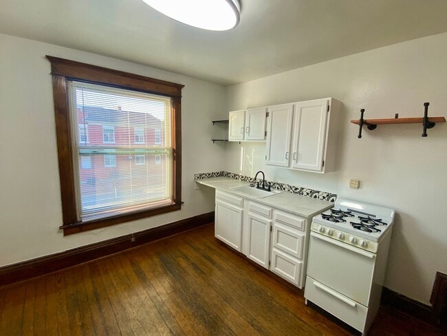 Building Photo - 1005-1017 W. 14th Ave.