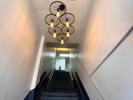 Building Features Freshly painted stairway, modern motion-detector lighting, direct apartment access - 353 High St