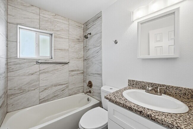 Building Photo - $1,440.95 with $300 Off the first month's rent,  2 Beds - 1 Bath, Condo in Denver with Granite Co...